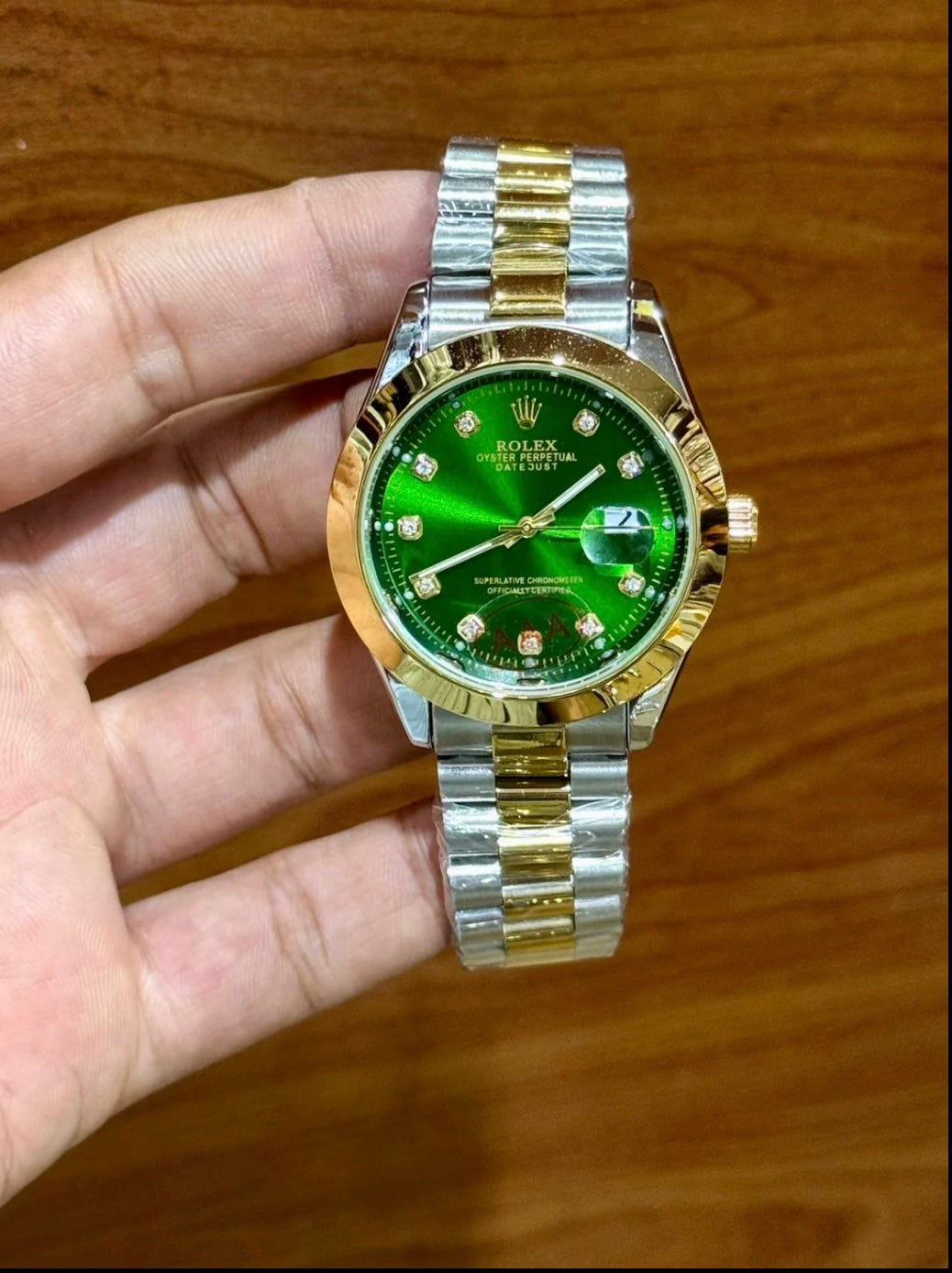 ROLEX Green dial watch